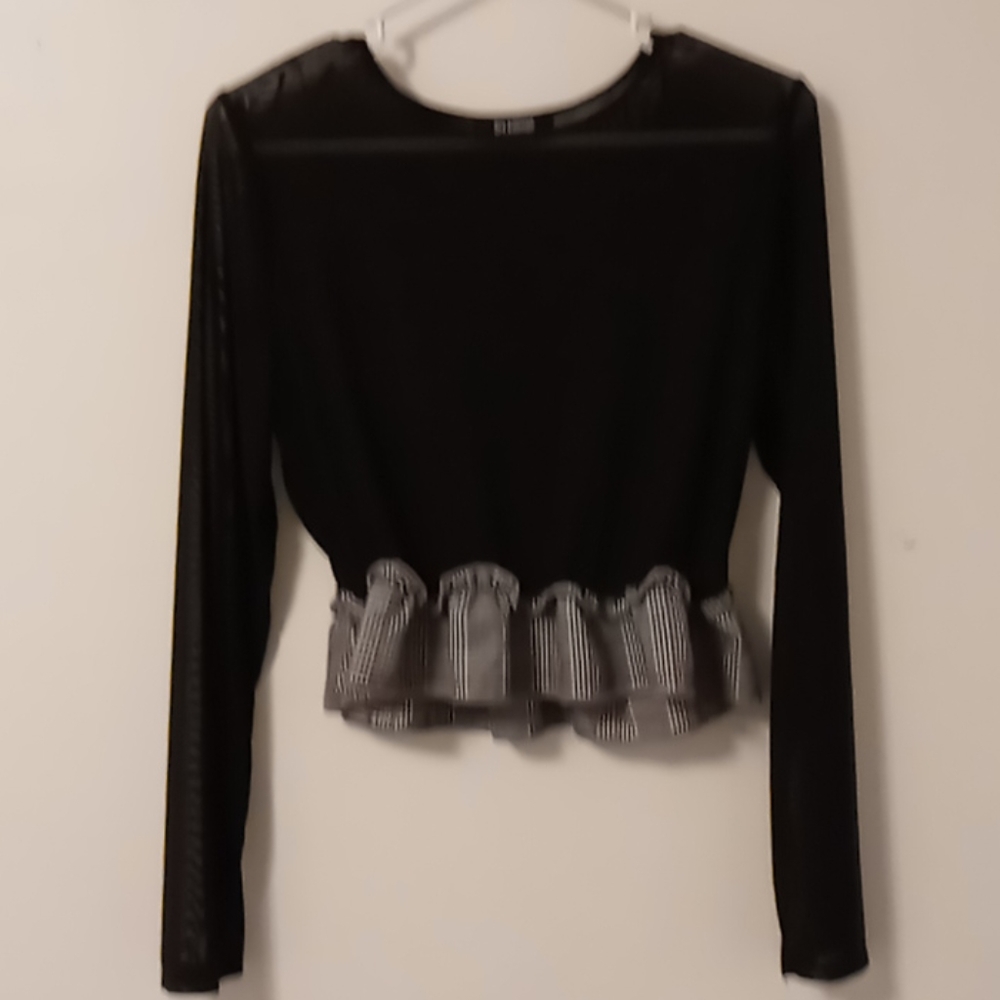 Sheer top with plaid ruffle
